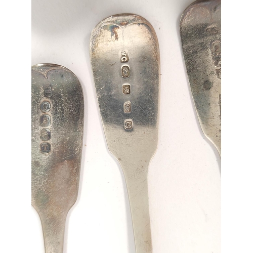 100 - Set of twelve silver dessert spoons, crested fiddle pattern, by C Cummins, Dublin, 1827, 280g.