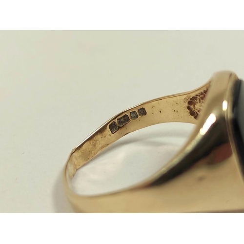 75 - 9ct gold signet ring, with oval carnelian, and another onyx, 7.5g gross, sizes 'U' and 'R'.