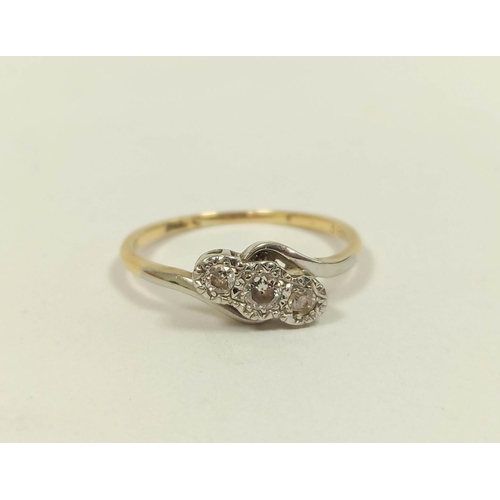 78 - Diamond three stone ring in gold, '18ct', size 'Q', 2.5g.