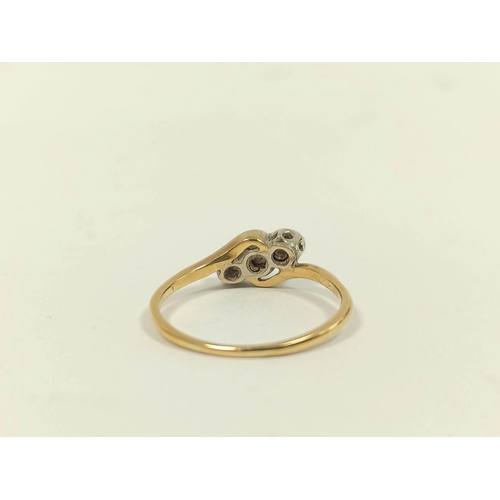 78 - Diamond three stone ring in gold, '18ct', size 'Q', 2.5g.