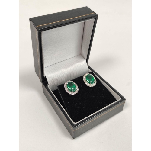 84 - Pair of emerald and diamond cluster ear studs, in 18ct gold.