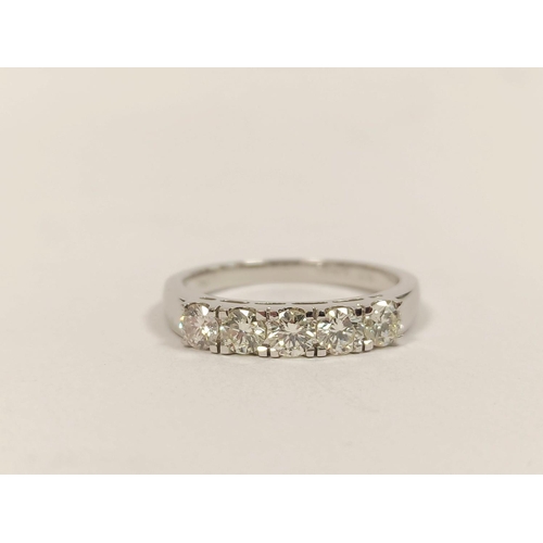 88 - Diamond five-stone ring, in 18ct white gold, approximately .75ct, size 'N'.