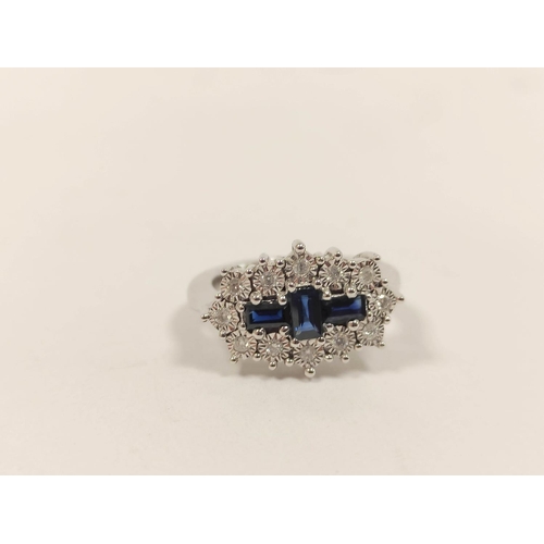 97 - Diamond and sapphire oval cluster ring in 9ct white gold, size 'O'.