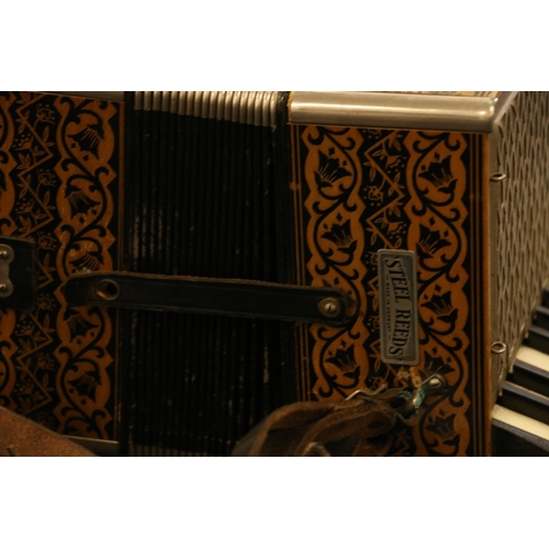 193 - Hohner accordion and travelling case.