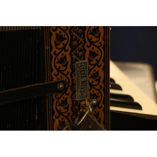 193 - Hohner accordion and travelling case.