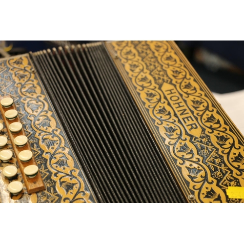 193 - Hohner accordion and travelling case.