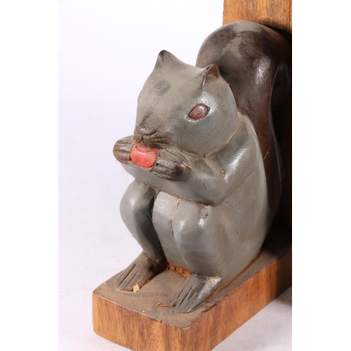 199 - Pair of squirrel bookends, 20cm high.