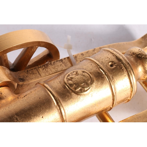 200 - Cast gilt metal cannon on carriage.