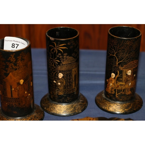 87 - Japanese lacquerware footed dish, 29cm, three vases, and a lidded jar.