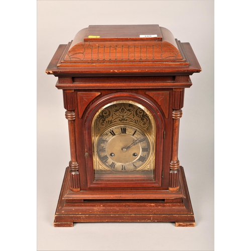 258 - Mahogany cased mantle clock with brass arch dial 47cm h