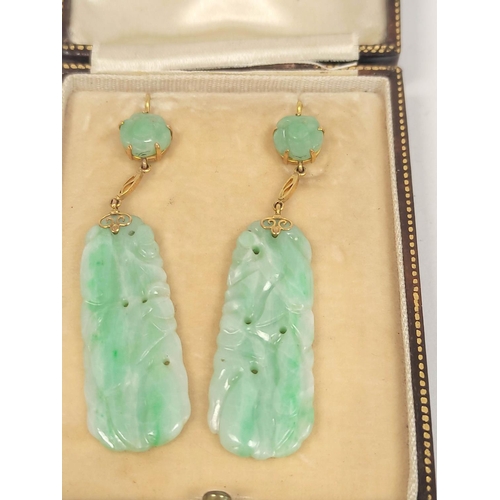 113 - Pair of jadeite drop earrings of tapering shape with bead, in gold 9ct.