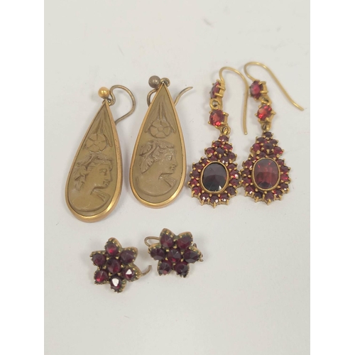 121 - Pair of lava cameo drop earrings in gold and two other pairs, garnet.  (6).