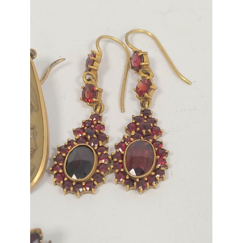 121 - Pair of lava cameo drop earrings in gold and two other pairs, garnet.  (6).