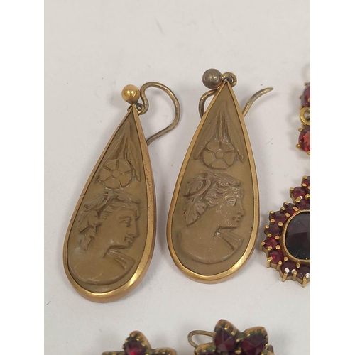 121 - Pair of lava cameo drop earrings in gold and two other pairs, garnet.  (6).