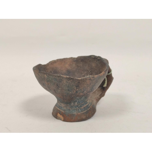 349 - Antique earthenware libation cup, poss. Persian or Middle eastern, with scroll handle, 6cm high.