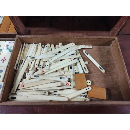 350 - 20th century Chinese Mah-Jong set, the bone tiled pieces contained in a five drawer teak cabinet wit... 