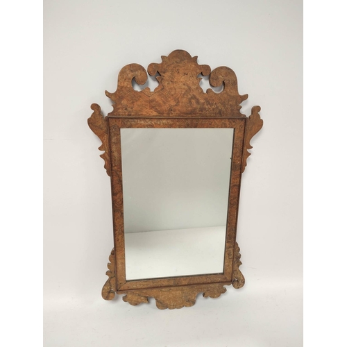 386 - Georgian walnut fret frame wall mirror. 74cn high x 45cm wide