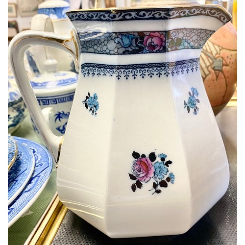 296 - Large decorated stoneware jug, three others, leaf decorated vase and a hardwood stand