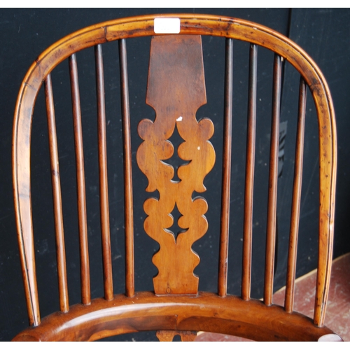 387 - Antique yew wood and elm Windsor rocking chair with hoop frame, stick back with pierced splat, pad a... 