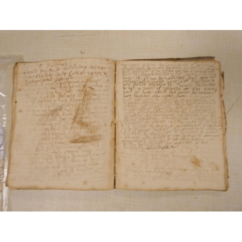 299 - Commonplace Book.  Small quarto commonplace book in well worn vellum covered brds. 144pp, closely wr... 