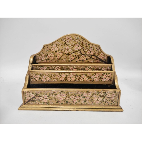 181 - Gilt lacquered letter rack decorated with cherry blossom motif, a papier-mâché lacquered  tray with ... 