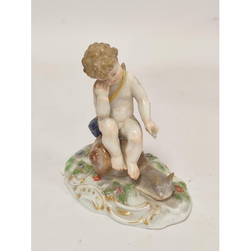 184 - Decorative porcelain to include a 19th century Meissen figure of a contemplative cherub riding on a ... 