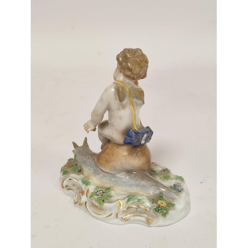 184 - Decorative porcelain to include a 19th century Meissen figure of a contemplative cherub riding on a ... 