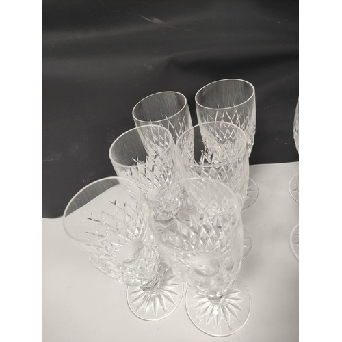 269 - Suite of cut-glass to include six large tumblers, with six smaller, six red and white wine glasses a... 