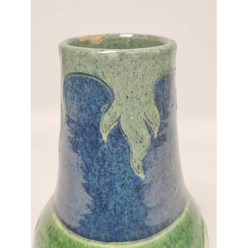 272 - Art Pottery baluster vase, with incised and thistle head decoration, 28cm.