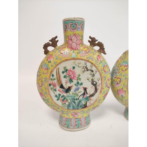 318 - Pair of Chinese famille rose moon flasks, Qianlong revival, possibly Republic period with grotesque ... 