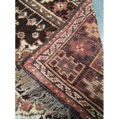 356 - Mid-century Persian wool Shiraz rug, brown field interspersed with geometric motifs and central pink... 