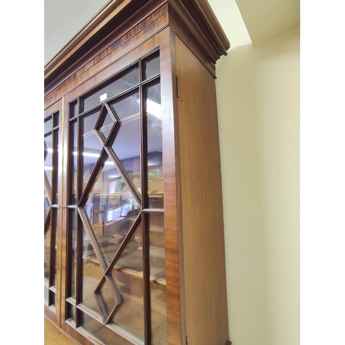 367 - 19th century mahogany bookcase on chiffonier base, the Regency style bookcase with two glazed astrag... 