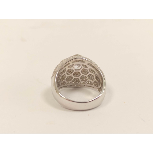 111 - Large silver cocktail ring set with white cubic zirconia.