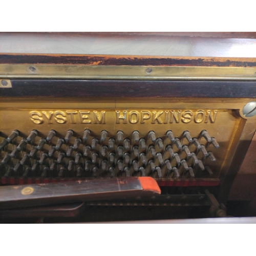 354 - 20th century upright piano by J & J Hopkinson of London H122cm W139cm D62cm.