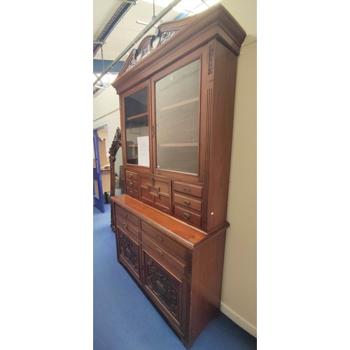 368 - Late Victorian mahogany secretaire bookcase on sideboard base, the bookcase section with scroll corn... 