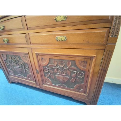 368 - Late Victorian mahogany secretaire bookcase on sideboard base, the bookcase section with scroll corn... 