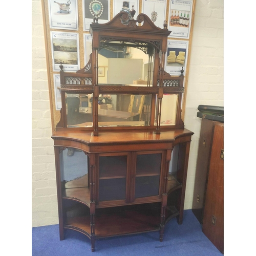 390 - Late Victorian mahogany three tiered mirrored sideboard the cupboard base flanked by two shelves and... 