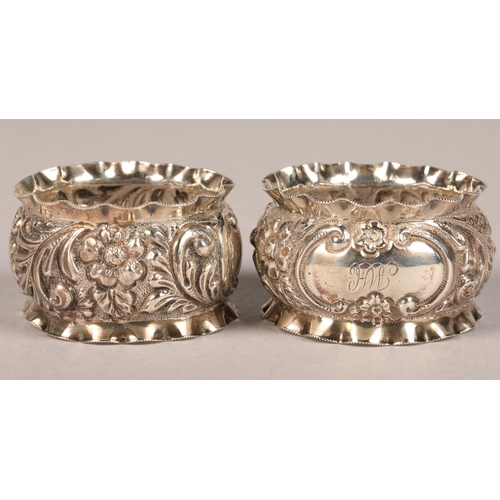 173 - Boxed set of two silver monogrammed napkin rings and two cutlery rests, Birmingham 1897