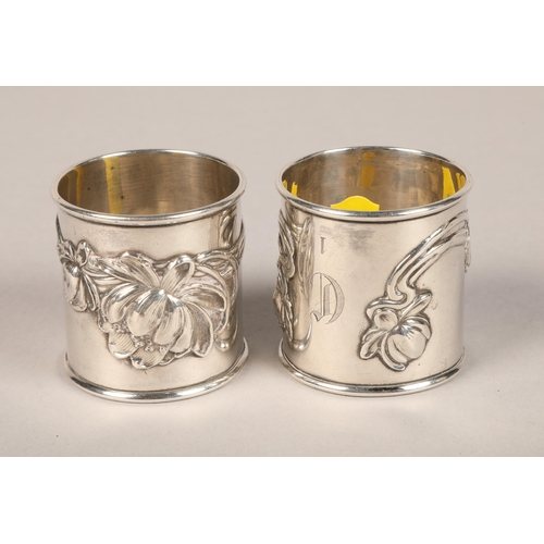 198 - Pair floral designed 'sterling' silver napkin rings