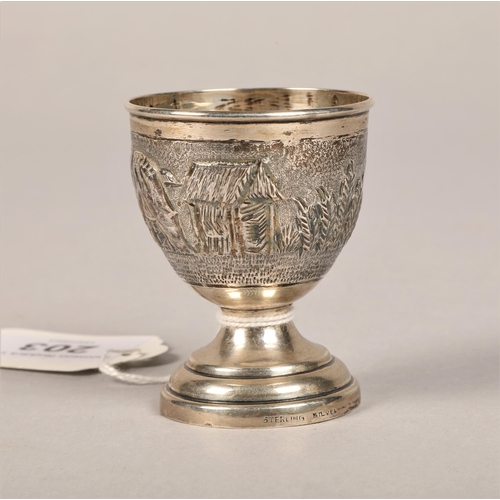 203 - Oriental design 'sterling silver' egg cup