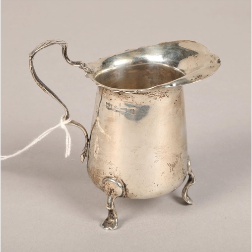 205 - Small silver jug with feet 63g