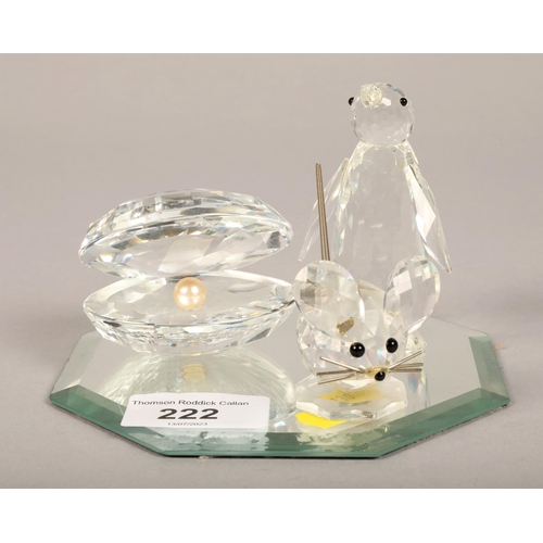 222 - Three Swarovski figures, mouse, penguin, and pearl shell, with mirror plate (4)