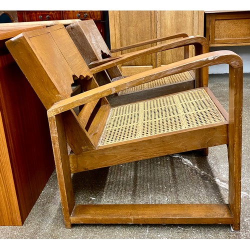 603 - Pair of 1930s Burmese teak and can armchairs