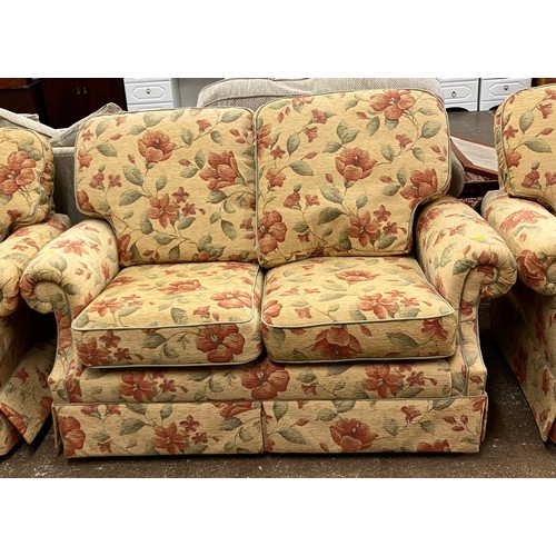 594 - Pair of two- seater sofas with matching pair of arm chairs (4)