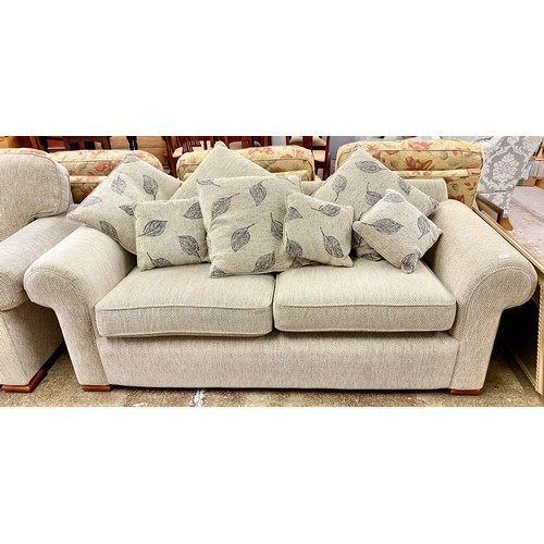 595 - Two seater sofa with matching arm chair. (2)