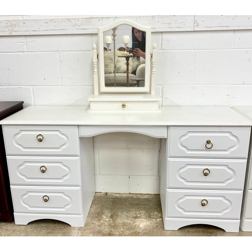 621 - White  bedroom suite comprising of five bedside cabinets and a dressing table with cheval mirror