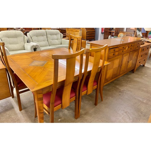 579 - Contemporary oriental style hardwood extendable dining table with four matching chairs and matching ... 