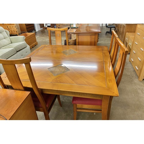 579 - Contemporary oriental style hardwood extendable dining table with four matching chairs and matching ... 