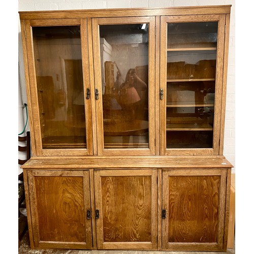 573 - Early 20th century Oak glazed book case over cupboard, 183 x 215 x 46 cm