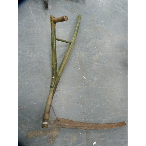 343 - Two scythes and a metal detector.